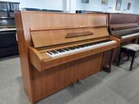 Bechstein 114 M von 1974 in Nussbaum satiniert